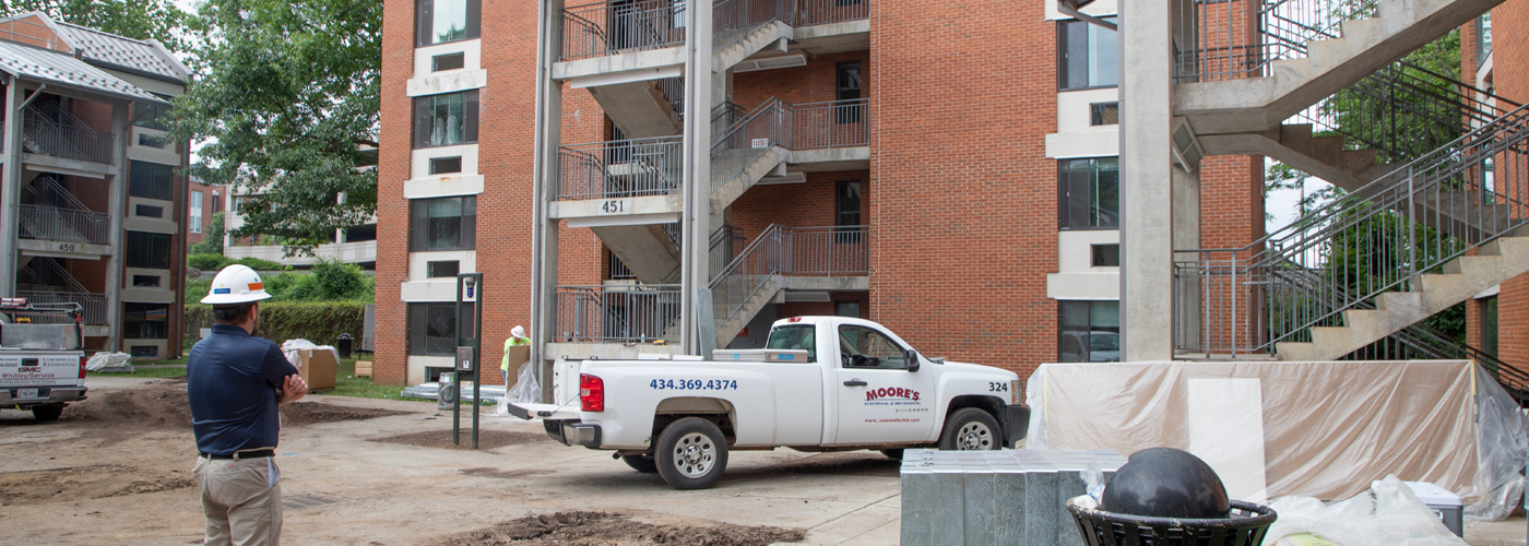 Jay Ortengren looks at the construction site for Lambeth Field Apartments