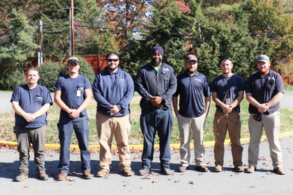 2021 UVA Apprenticeship Program graduates stand side by side in a row