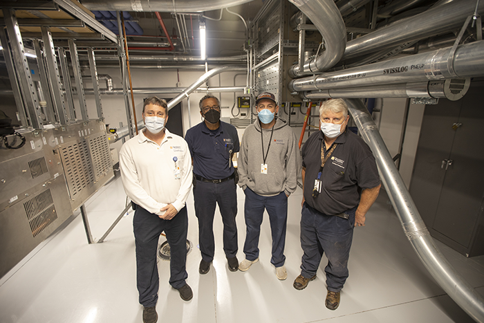 Group photo of the HSPP Pneumatic Tube System team