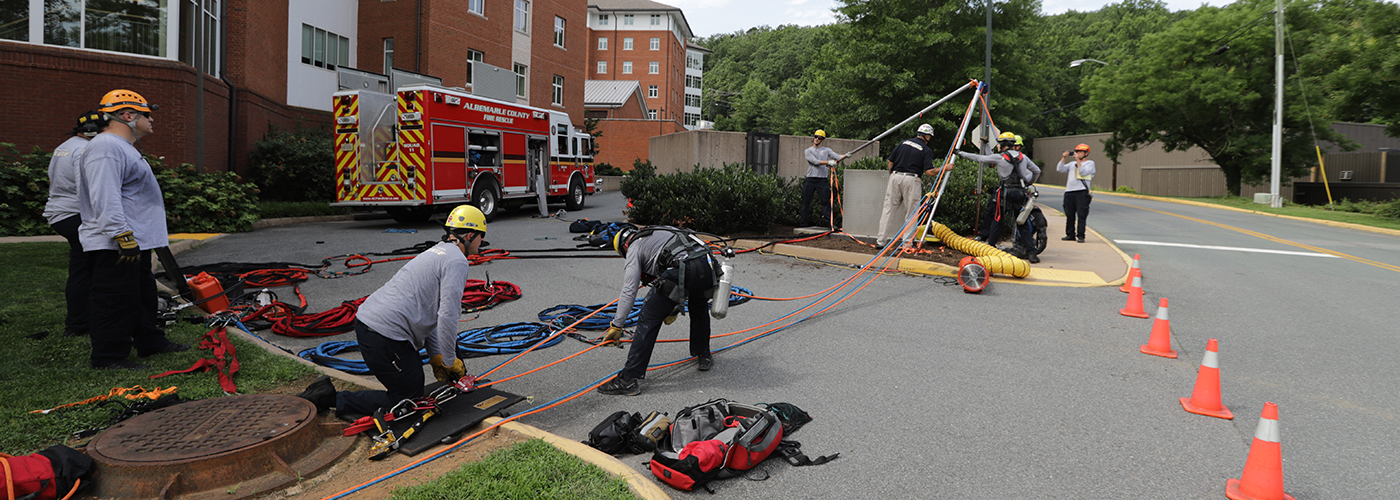 Firefighters preparing equipment for a rescue training exercise